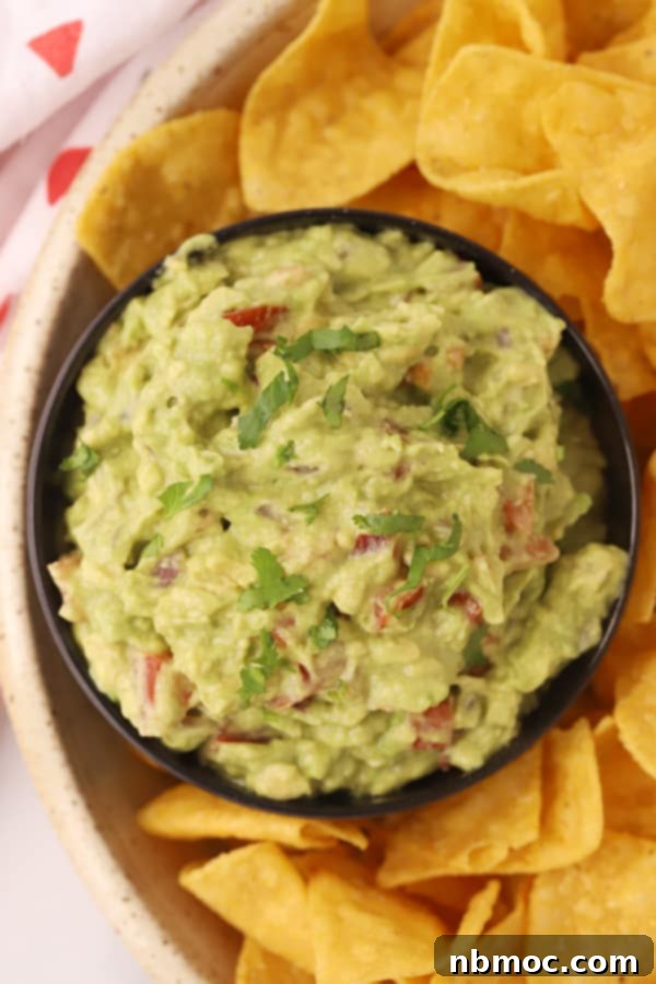 best guacamole and tortilla chips on a platter