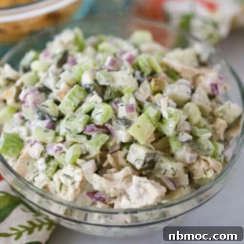 dill pickle chicken salad recipe in a glass bowl