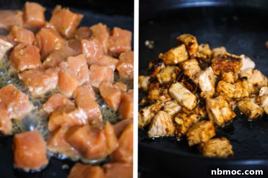 Honey garlic salmon being cooked on a cast iron skillet.
