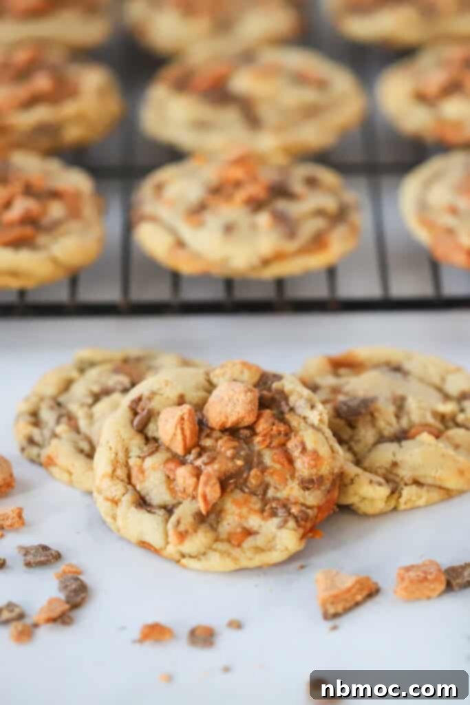 Butterfinger cookies cooling on a wire rack.