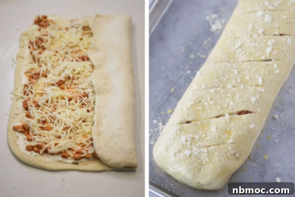 Buffalo Chicken Turnover 6 Stromboli rolled up into a log with slits cut into the top.