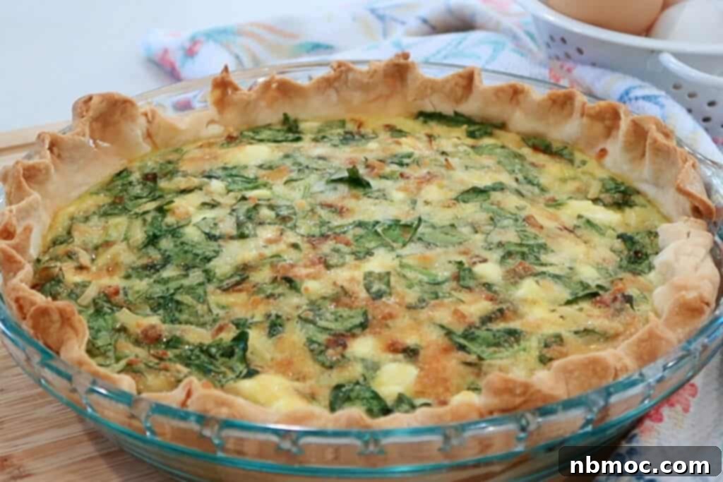 Mediterranean Spinach Feta Quiche 3 spinach and feta quiche in a pie crust.
