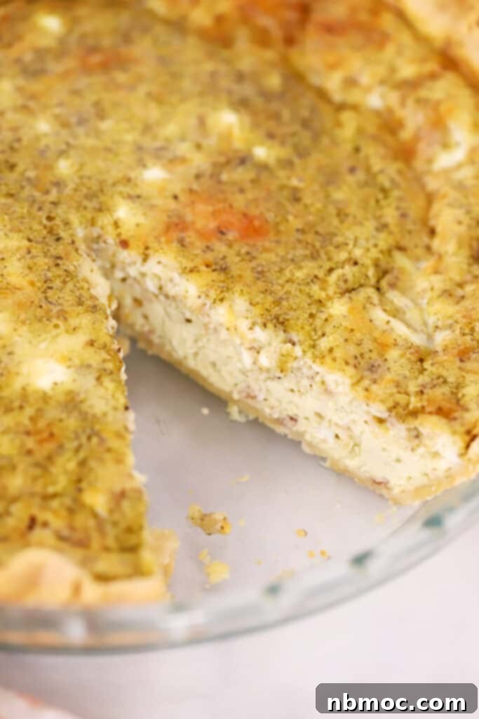 Triple Cheese Pesto Quiche 6 cut up homemade pesto quiche. types of quiche. pesto and eggs , egg pesto recipe. quiche sun dried tomato. cheese for pesto.