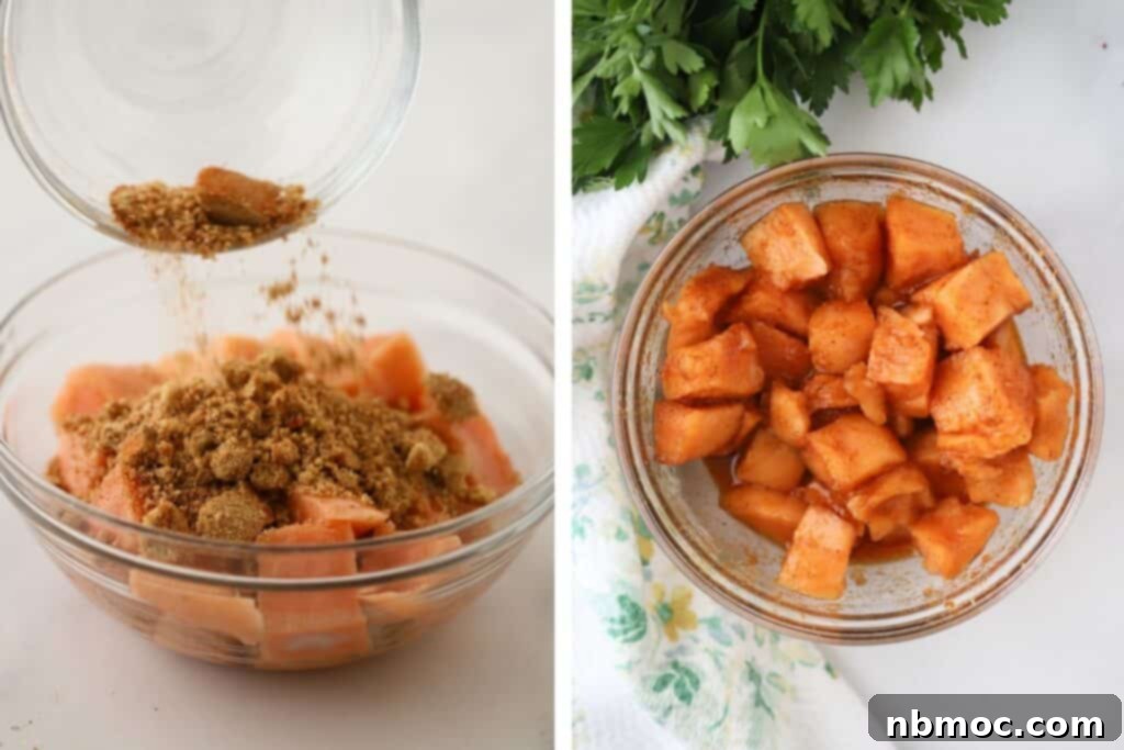 Raw salmon pieces being expertly seasoned with brown sugar and a fragrant blend of savory spices, preparing them for the air fryer to achieve perfect crispiness.