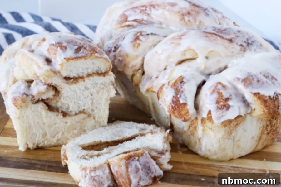 A close-up view of a sliced Cinnamon Twist Bread, revealing the beautiful swirls of cinnamon and brown sugar within the tender bread.
