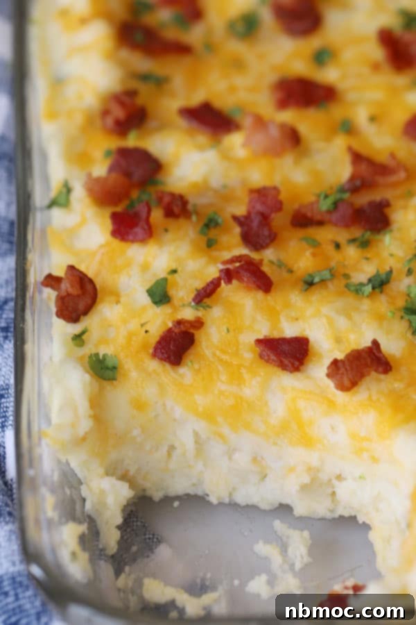twice baked potato casserole recipe with bacon and plenty of cheese.