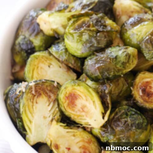 Golden Roasted Brussels Sprouts 5 Roasted Brussels sprouts in a serving dish.