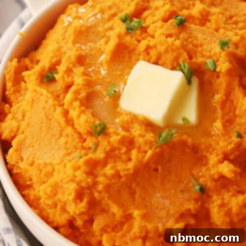 mashed sweet potatoes in a large white bowl